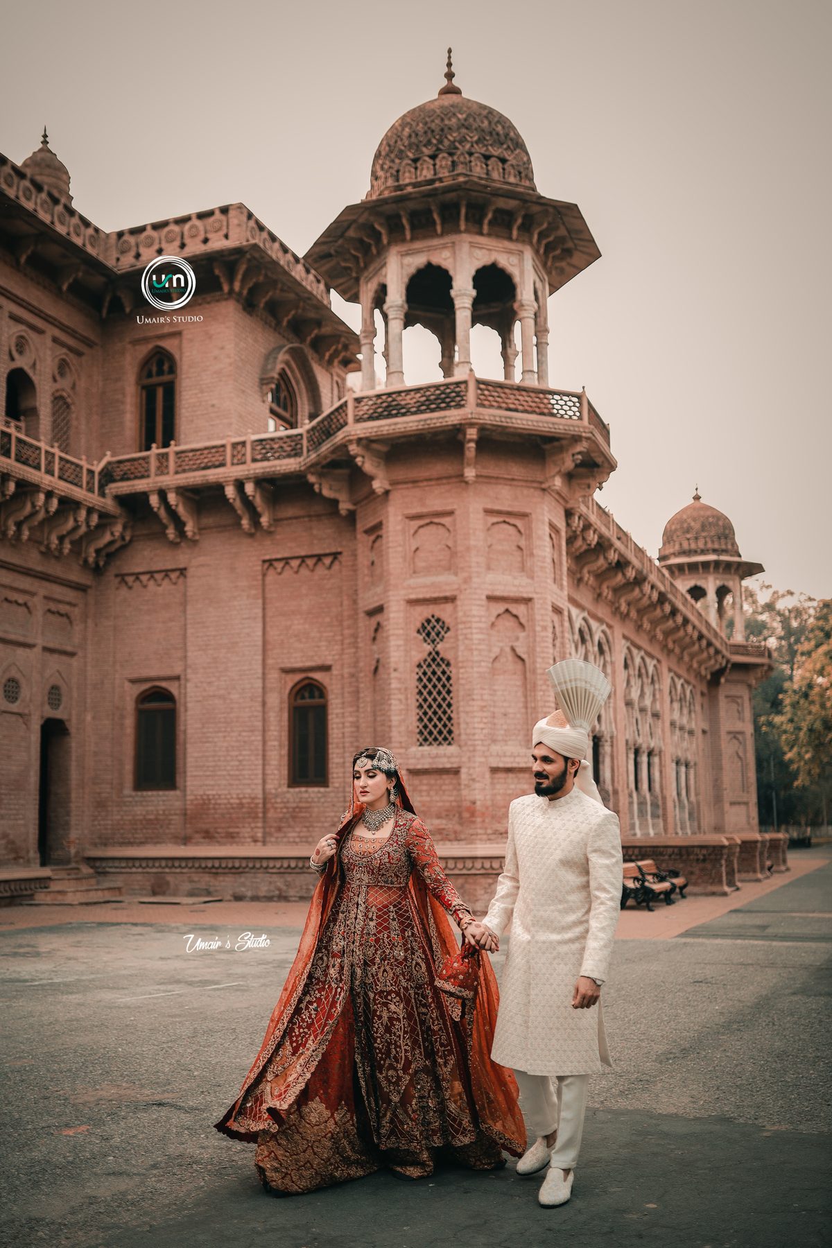 Bride and groom outside a Mughal heritage monument in Lahore